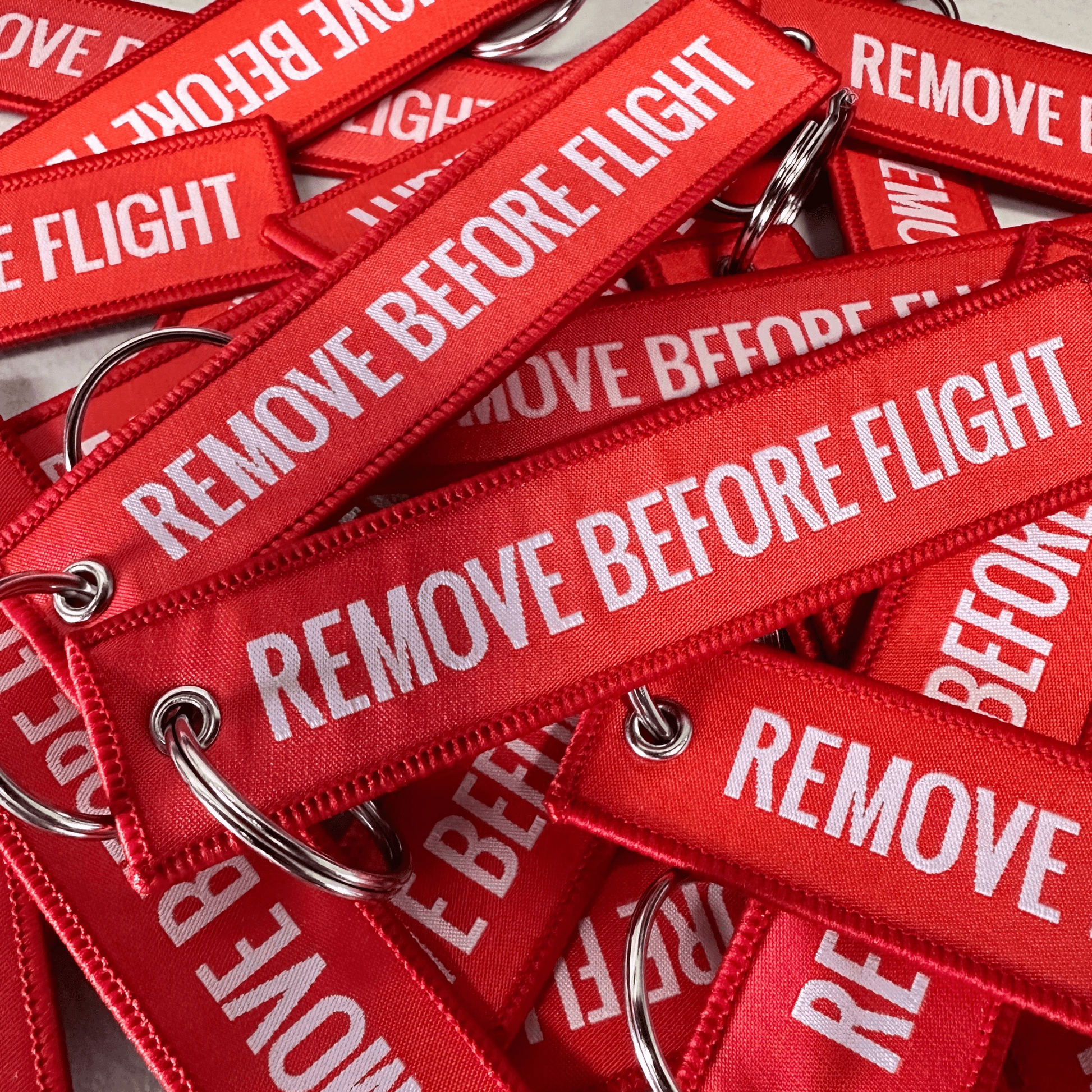 Keychain - "Remove Before Flight" - Heroes Rise Coffee Company